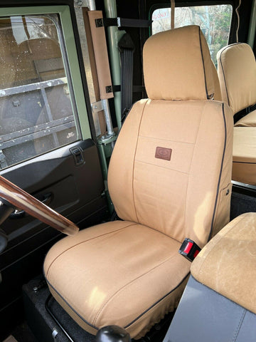 Canvas seat covers -  Land Rover Defender 1983-2007 front seats with single post headrests.